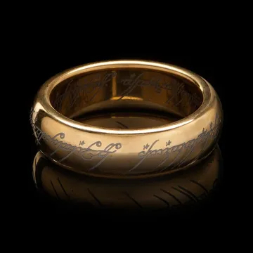 Wētā Workshop One Ring in gold plated tungsten carbide, with the Elvish inscription, on a black background